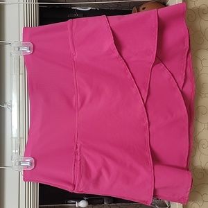 Women's pink golf skort